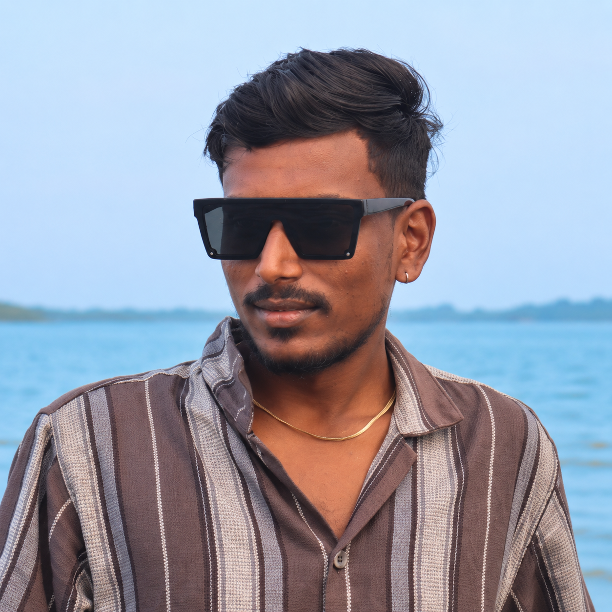 Man by the ocean